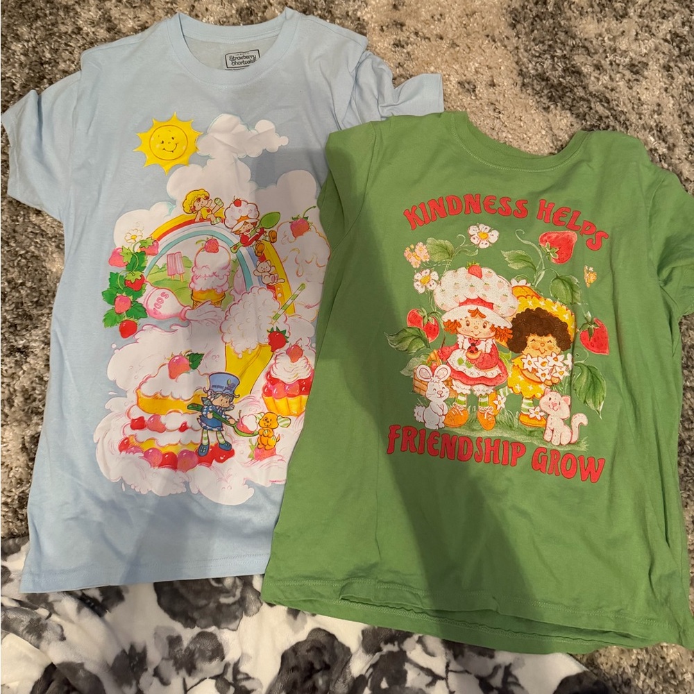 2 Strawberry Shortcake shirts size M.